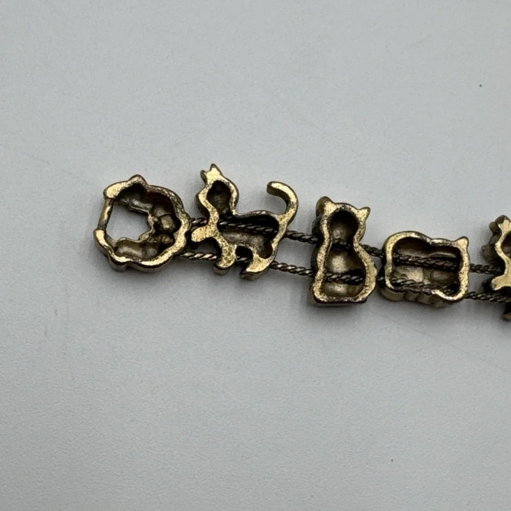 Vintage Avon Gold Tone Sliding Cat Charm Bracelet Rhinestone Red Heart Marked SP